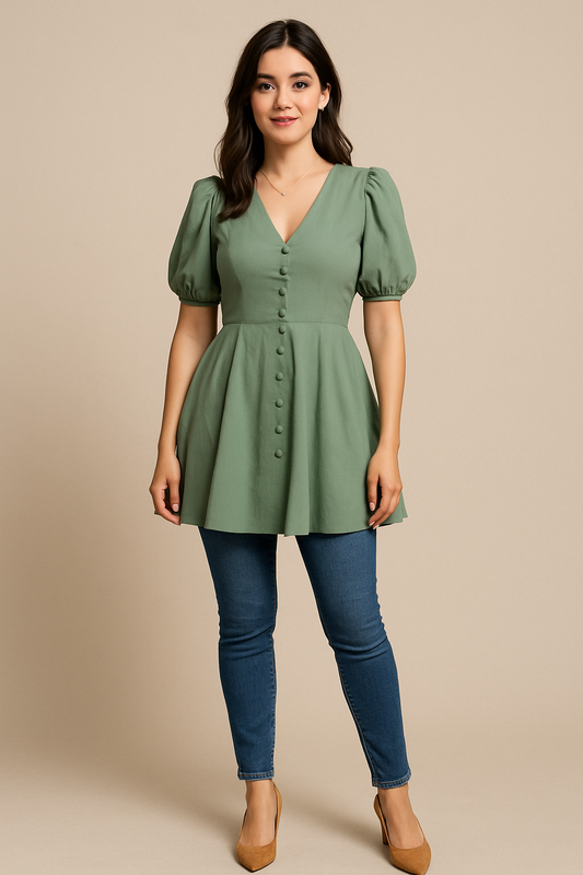 Woman wearing a sage green peplum top with puff sleeves and a button-down front